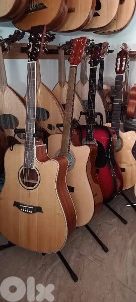 تشكيله غيتارات اكوستيك تبدا الاسعار للمستعمل ١٠٠ دولار 0