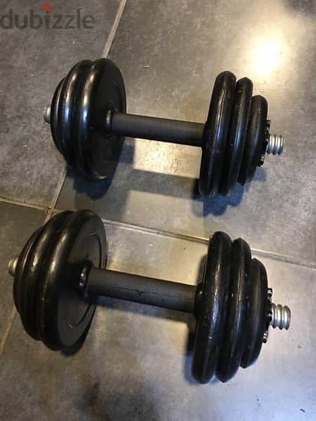adjustable dambells rubber like new we have also all sports equipment 0