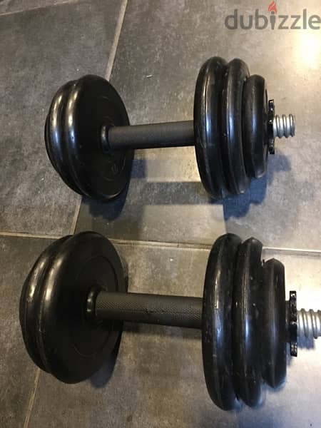 adjustable dambells rubber like new we have also all sports equipment 1