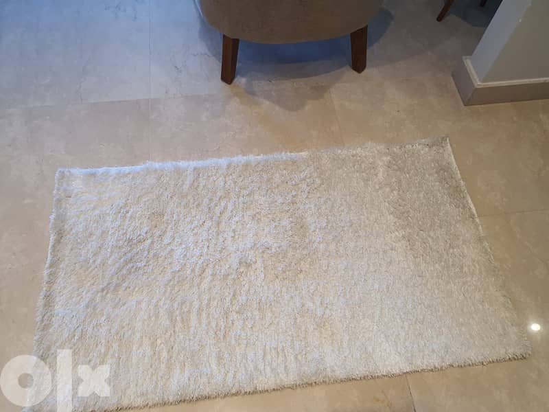2 white carpets 120*80 both $25 1