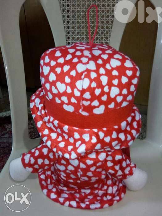 RED SINGING IN ARABIC PLUSH 50Cm as new LONG doll=18$ 2
