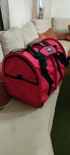 Pet carrier for big cats or small dogs.