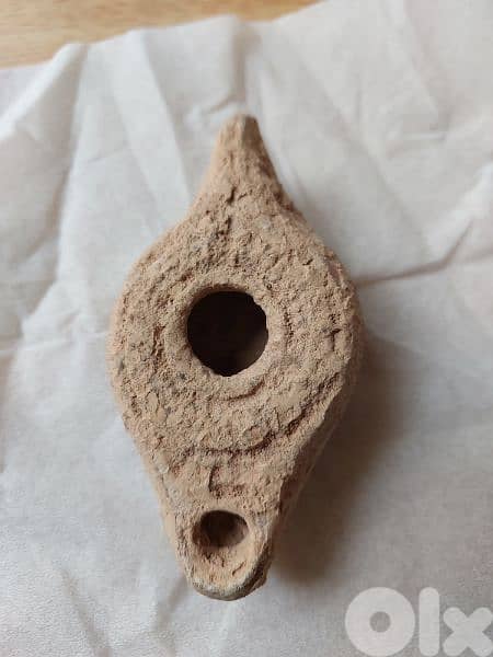 Ancient Terracotta clay  Roman Oil Lamp in third century CE 0