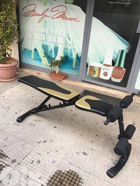 bench adjustable like new we have also all sports equipment 1
