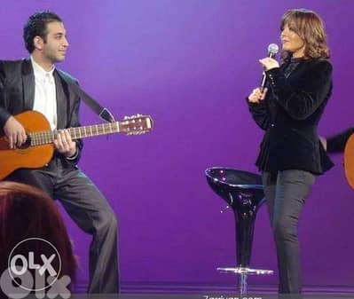 Guitar teacher استاذ غيتار