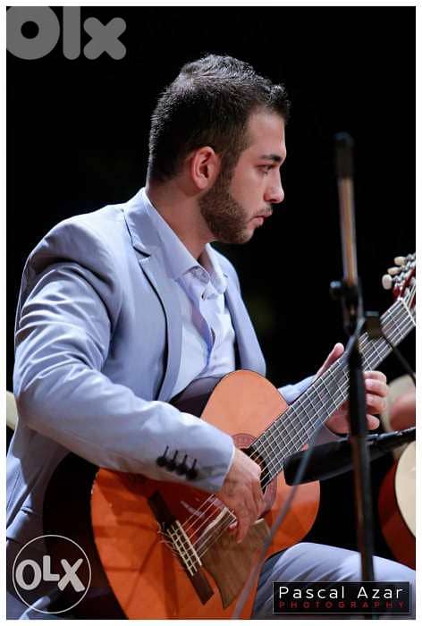Guitar teacher استاذ غيتار 1