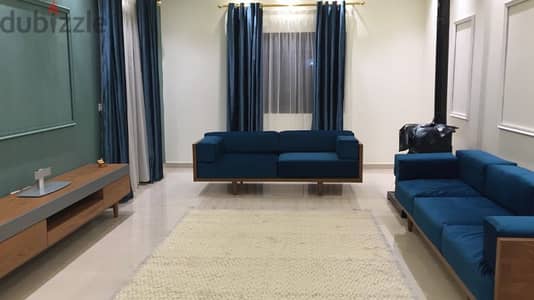 seating room 2 sofas and 1 pouf