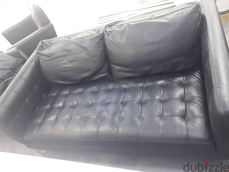 black leather sofa 1