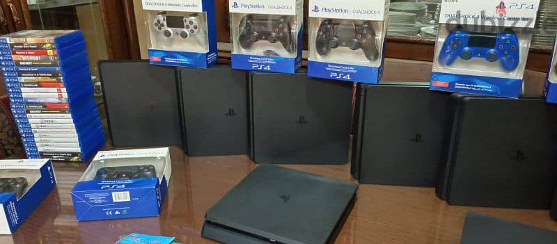 playstation 4 slim European with 2 controller all cable and 2 games 5