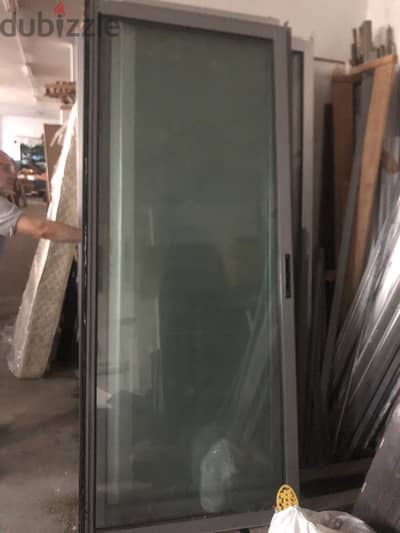 ابوابالمنبوم 210    86x  مع زجاج كامل جاهز  السعر 50$/المتر