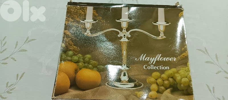 two 3 light silver plated candle holders. made in england 0