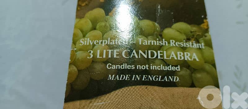 two 3 light silver plated candle holders. made in england 2