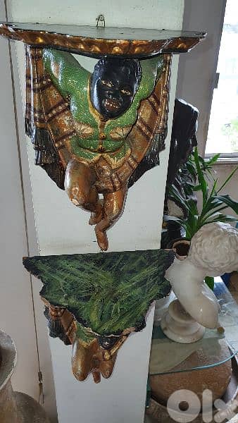 Aplique naîgre  en bois sculpté 1