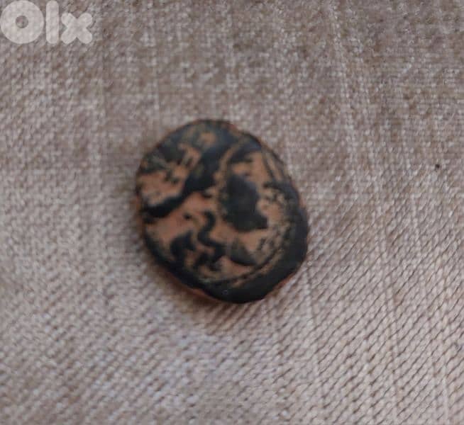 Ancient Greek Seleukid Bronze Coin year 125 0