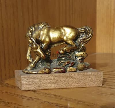 Antique Chinese red poecelaine horse figurine guilded with gold leaf