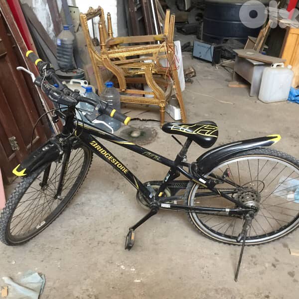 2 bicycles 200$ one شركه عالميه  (  head ) و ثانيه bridcestone 3
