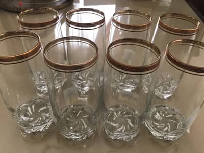 Long glass cups with gold trim. Brand new.