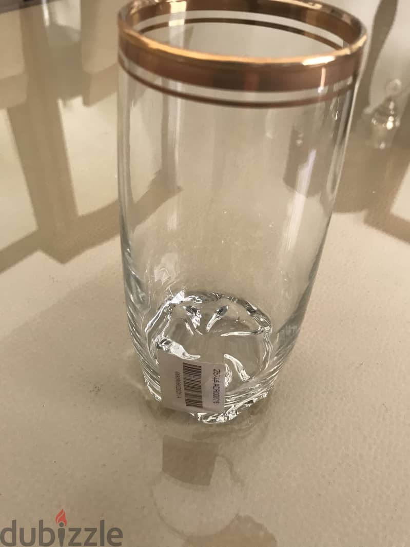 Long glass cups with gold trim. Brand new. 2