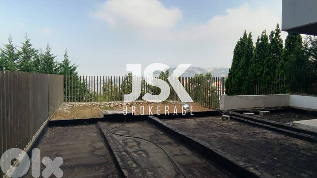 L12891-Spacious Apartment with Garden for Sale in Kfarhbeib 0