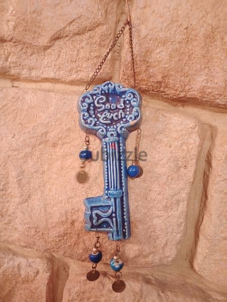 خرزة زرقاء للتعليق 0