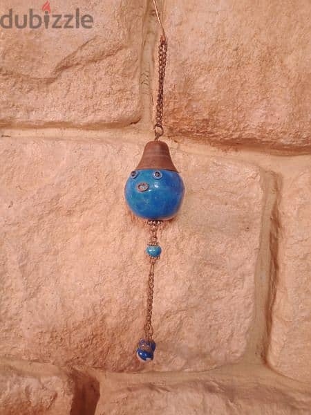 خرزة زرقاء للتعليق 2