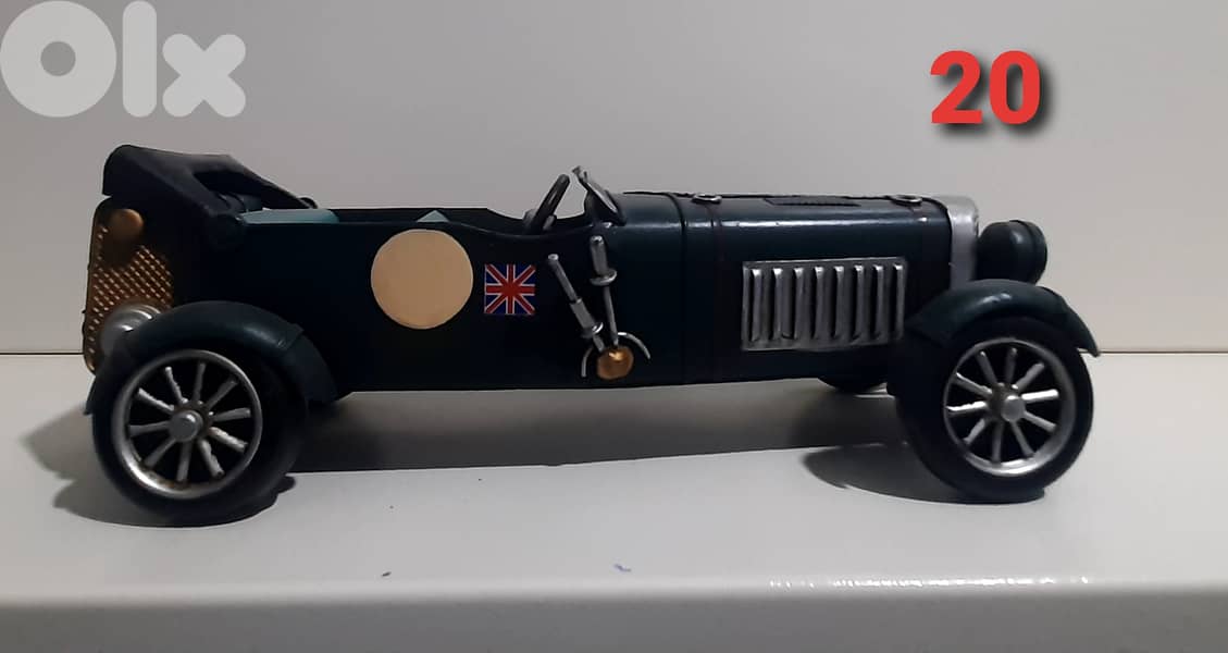 hand made old vintage cars and bycycle. 1