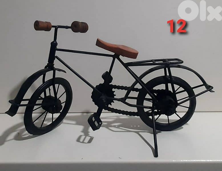 hand made old vintage cars and bycycle. 2