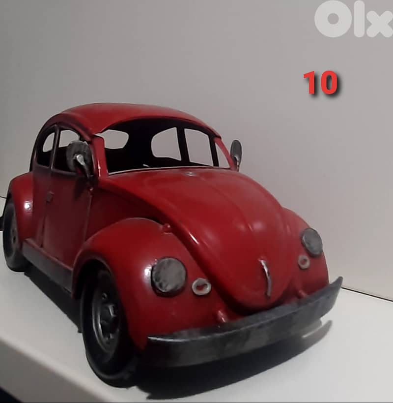 hand made old vintage cars and bycycle. 8