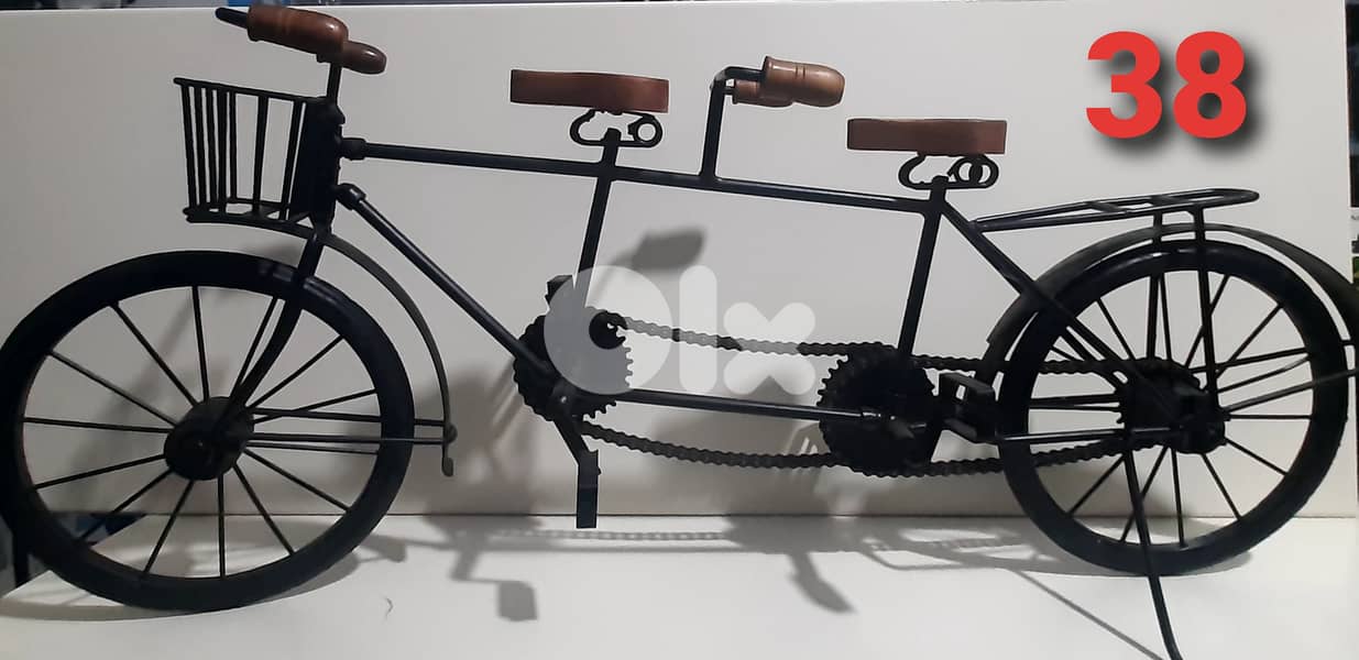 hand made old vintage cars and bycycle. 9