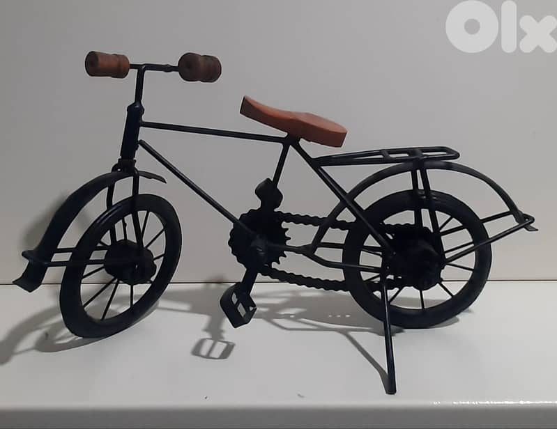 hand made old vintage cars and bycycle. 10
