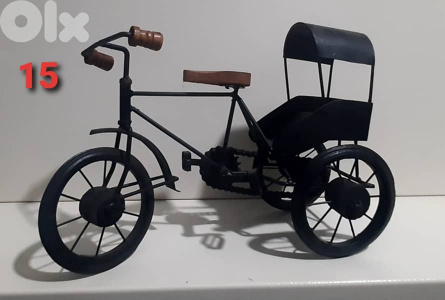 hand made old vintage cars and bycycle. 13